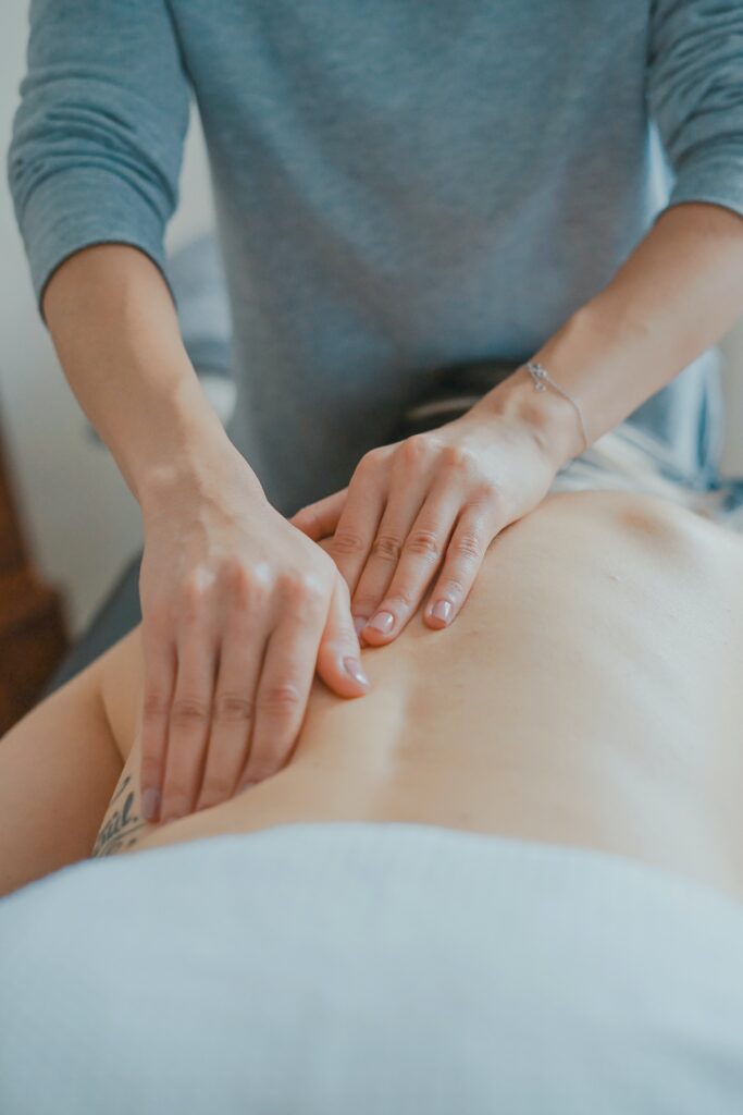 Woman receiving a massage from a professional therapist